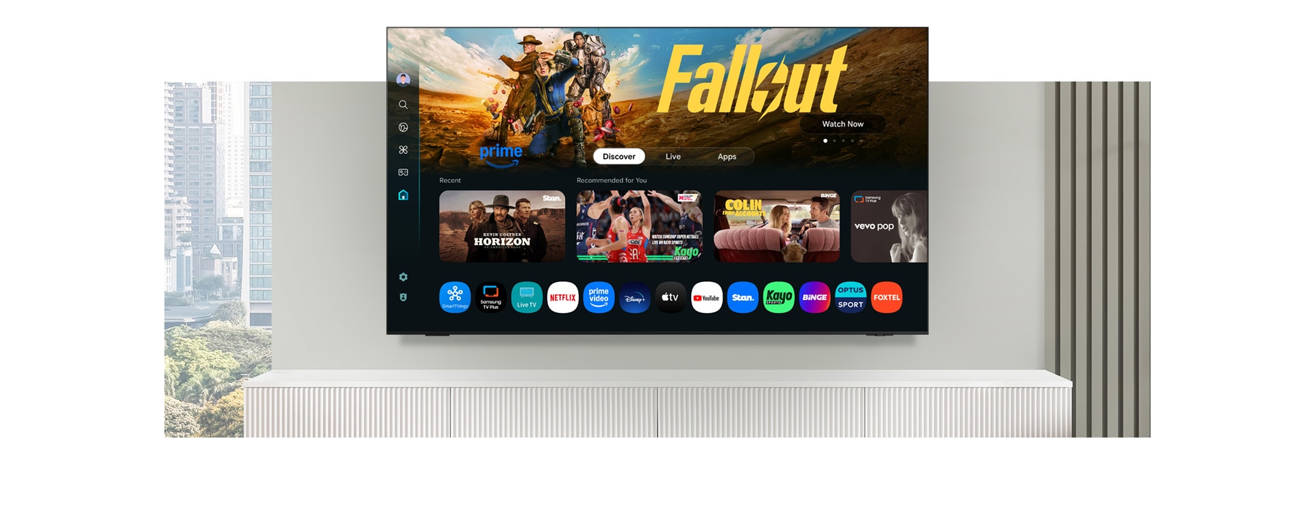 A TV displays a One UI Tizen screen with options to stream free TV and various apps and services like Samsung TV Plus.